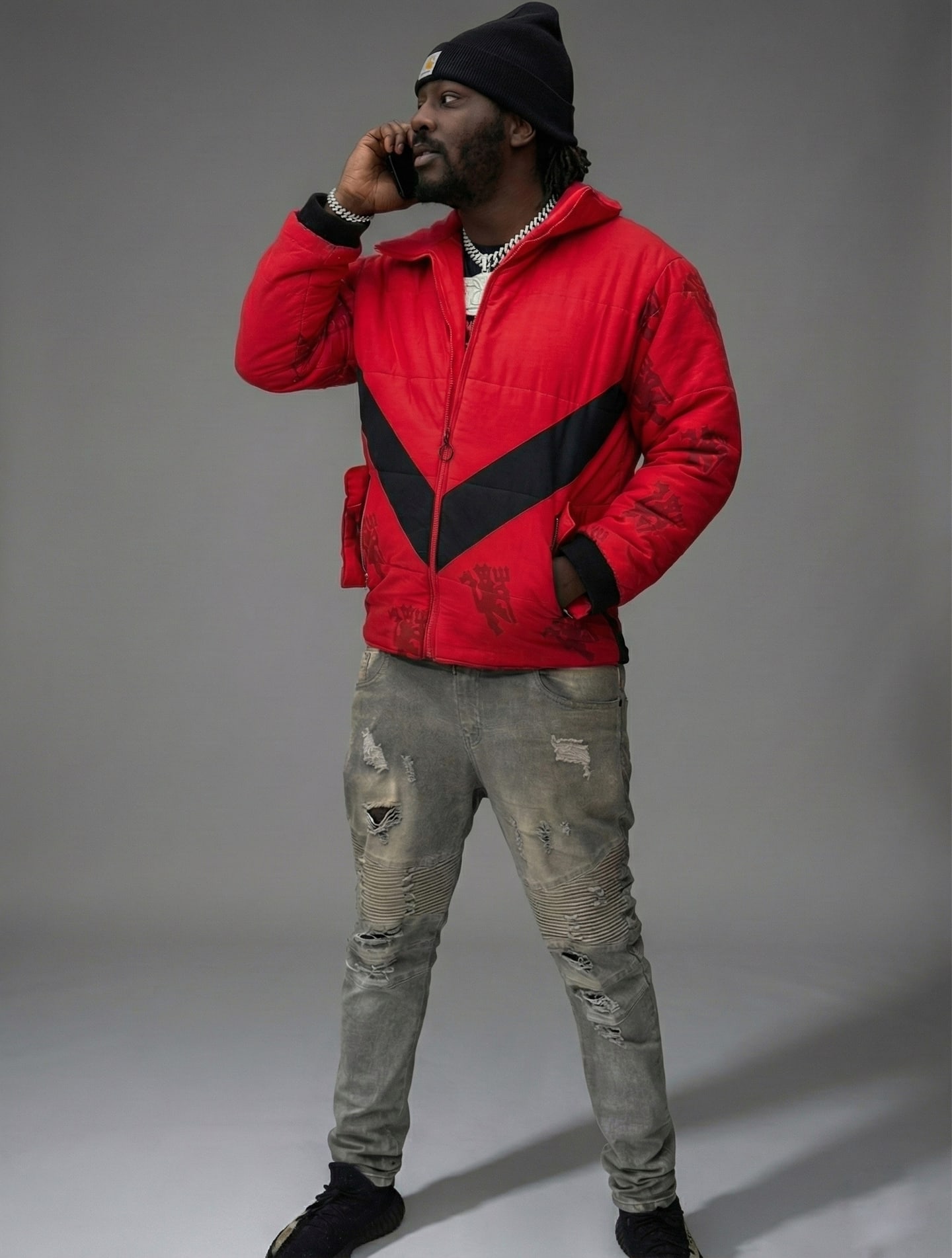 Custom TMADE puffer jacket built from a Manchester United jersey