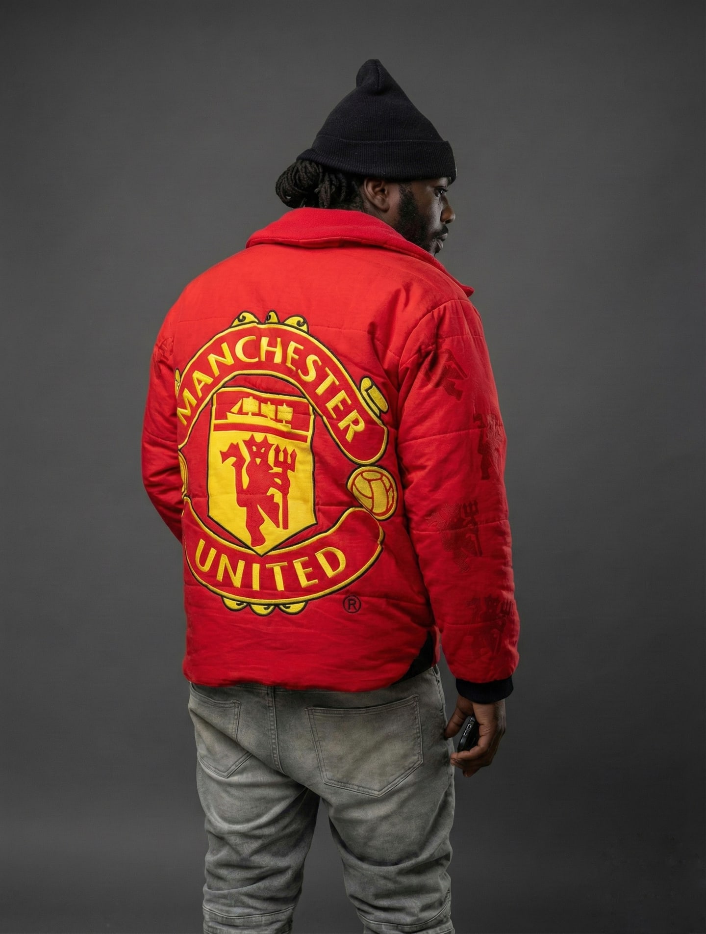 Custom TMADE puffer jacket built from a Manchester United jersey