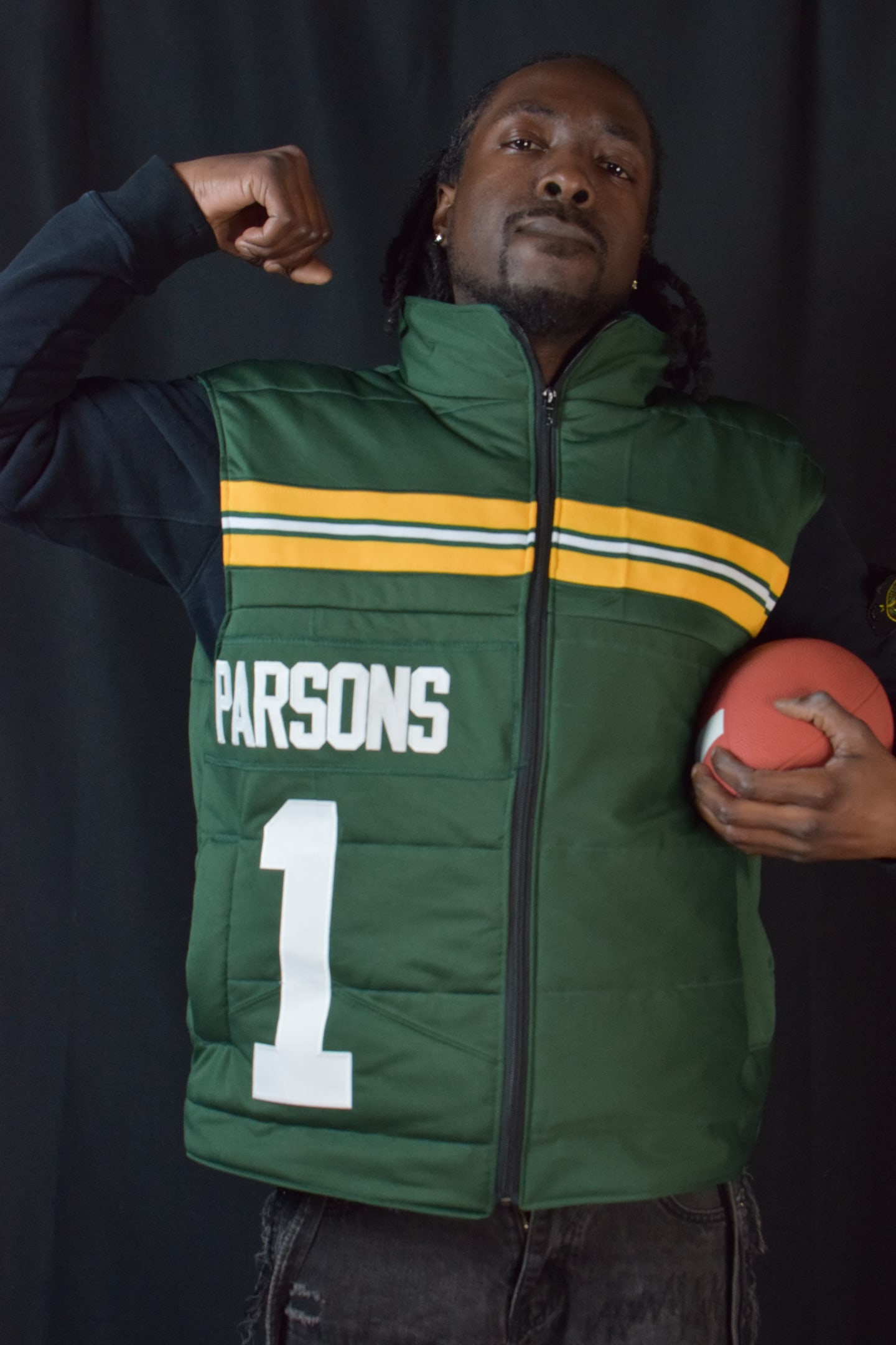 Custom TMADE puffer vest built from a Green Bay Packers Parsons number 1 jersey