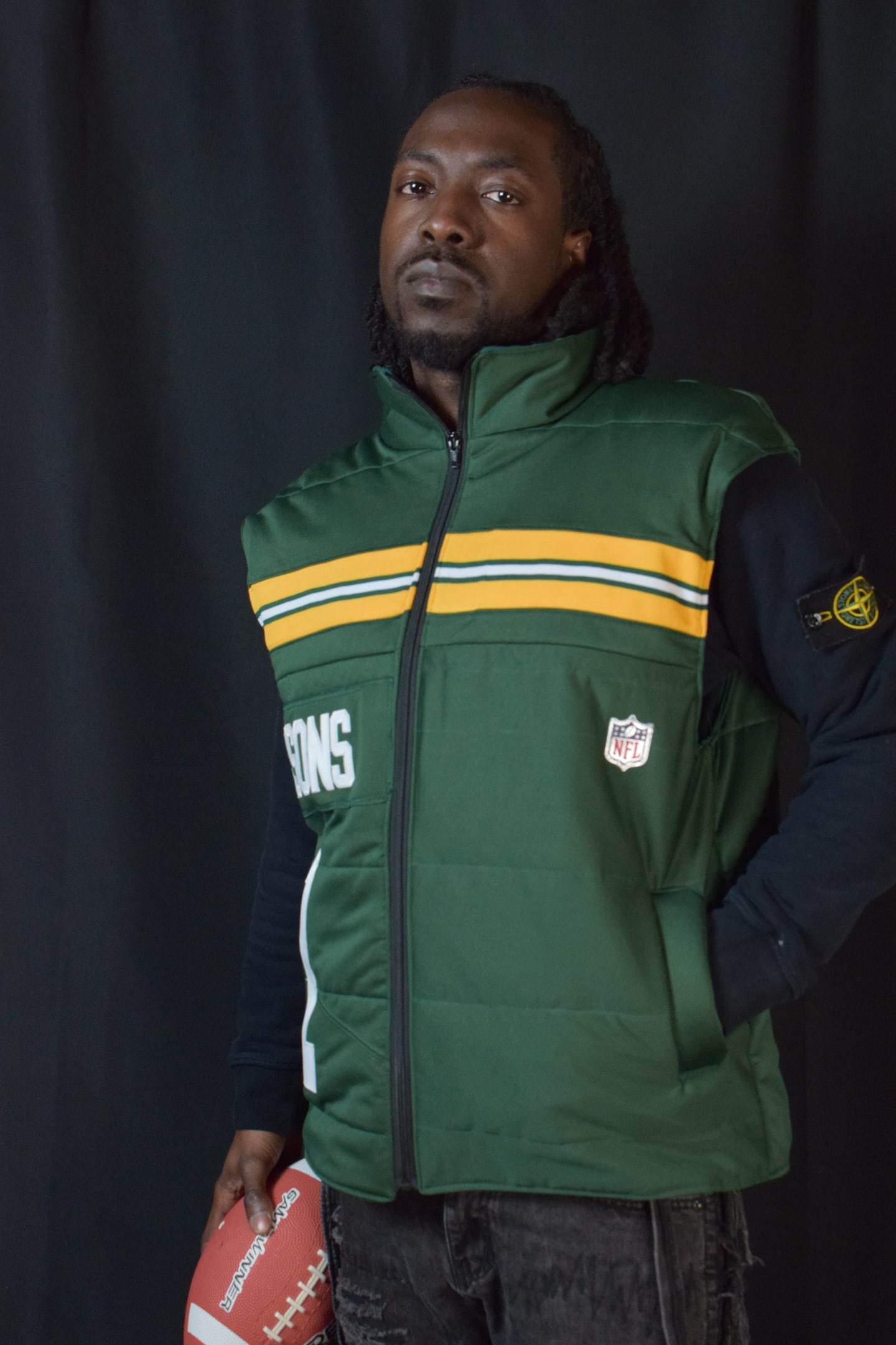 Custom TMADE puffer vest built from a Green Bay Packers Parsons number 1 jersey