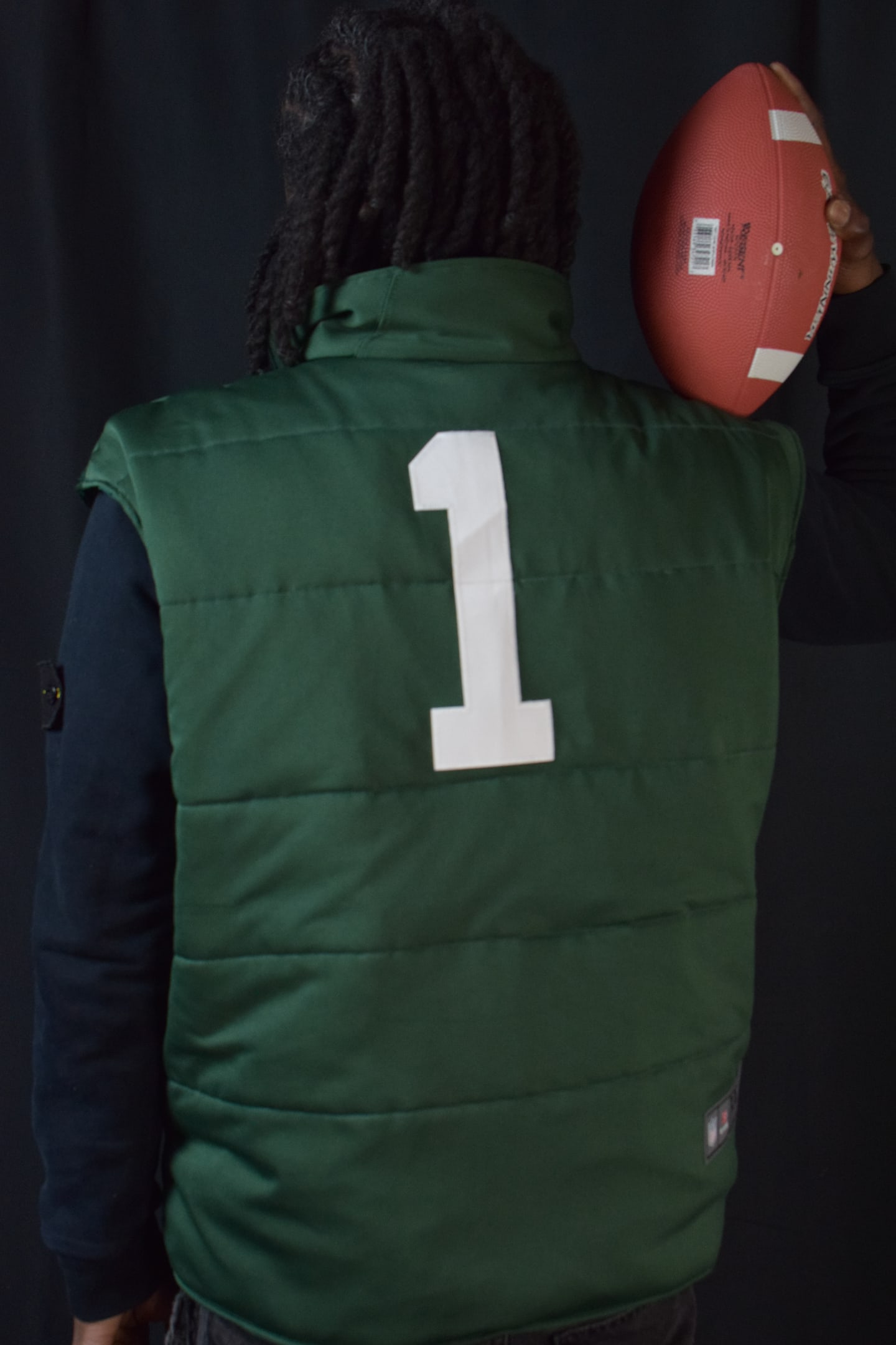 Custom TMADE puffer vest built from a Green Bay Packers Parsons number 1 jersey