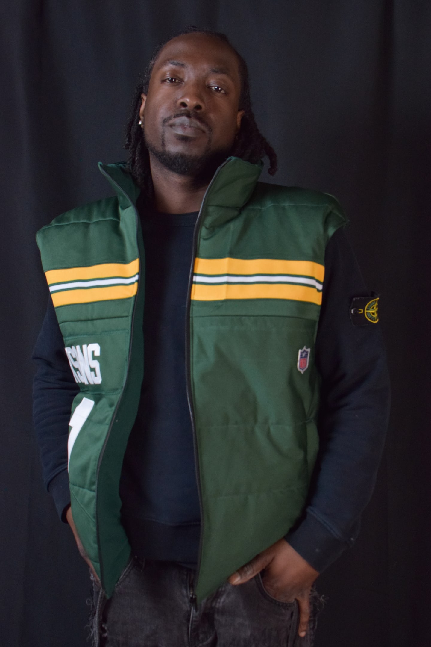 Custom TMADE puffer vest built from a Green Bay Packers Parsons number 1 jersey