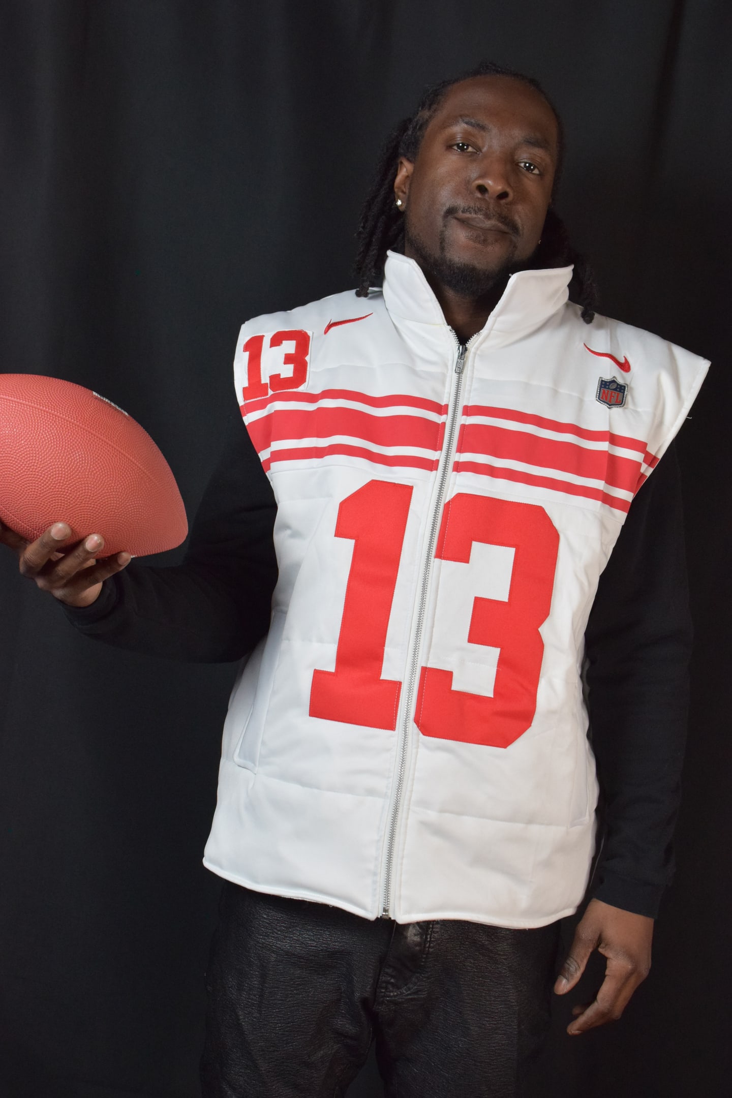 Custom TMADE puffer vest built from a New York Giants Beckham Jr number 13 jersey
