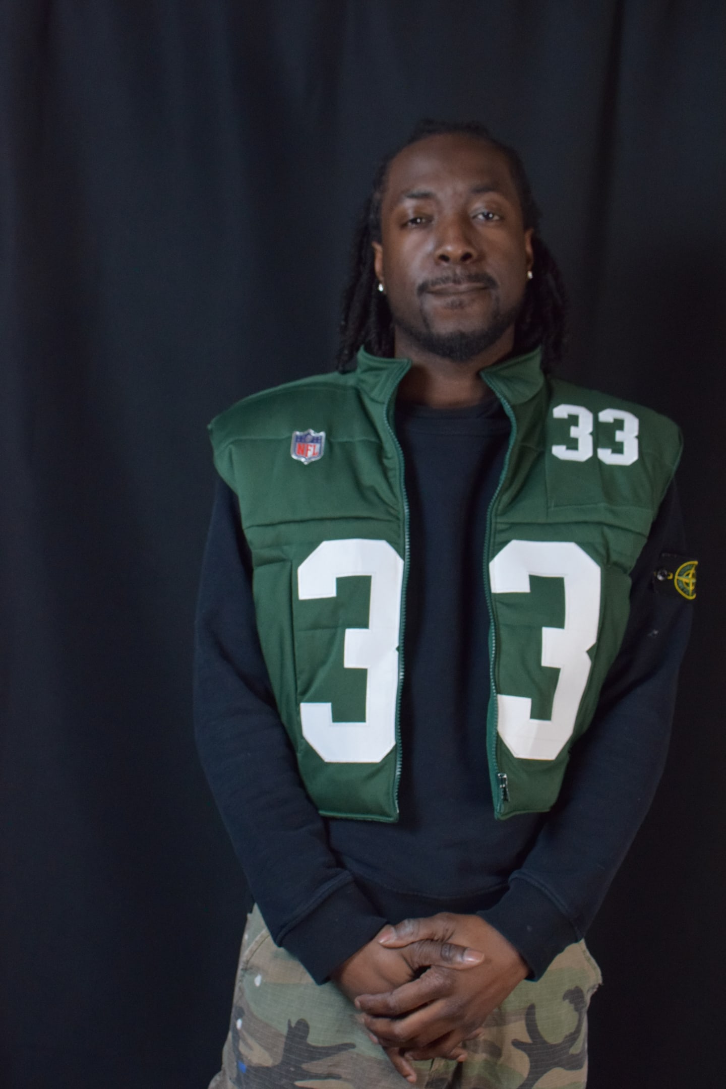 Custom TMADE puffer vest built from a Green Bay Packers Jones number 33 jersey