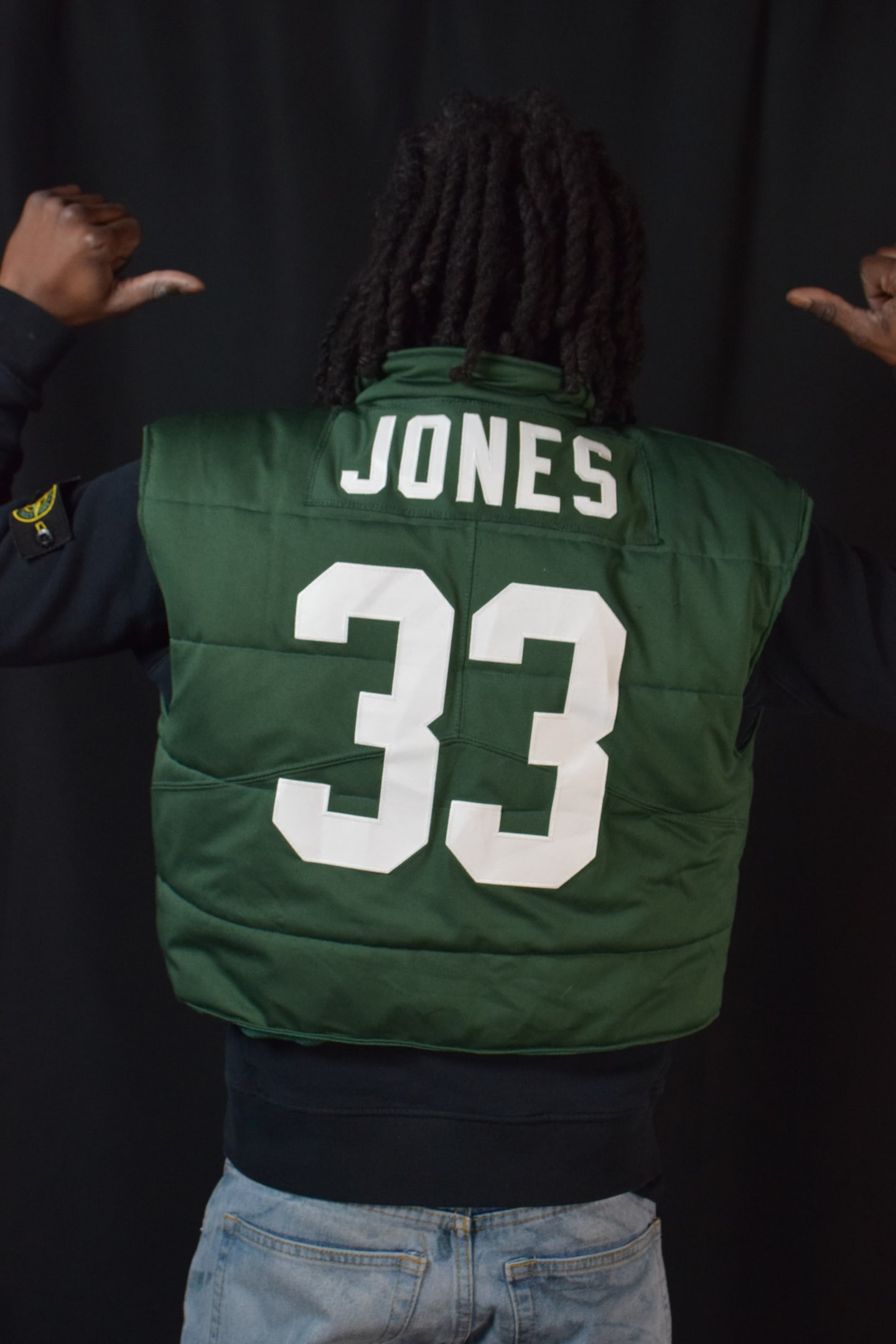 Custom TMADE puffer vest built from a Green Bay Packers Jones number 33 jersey