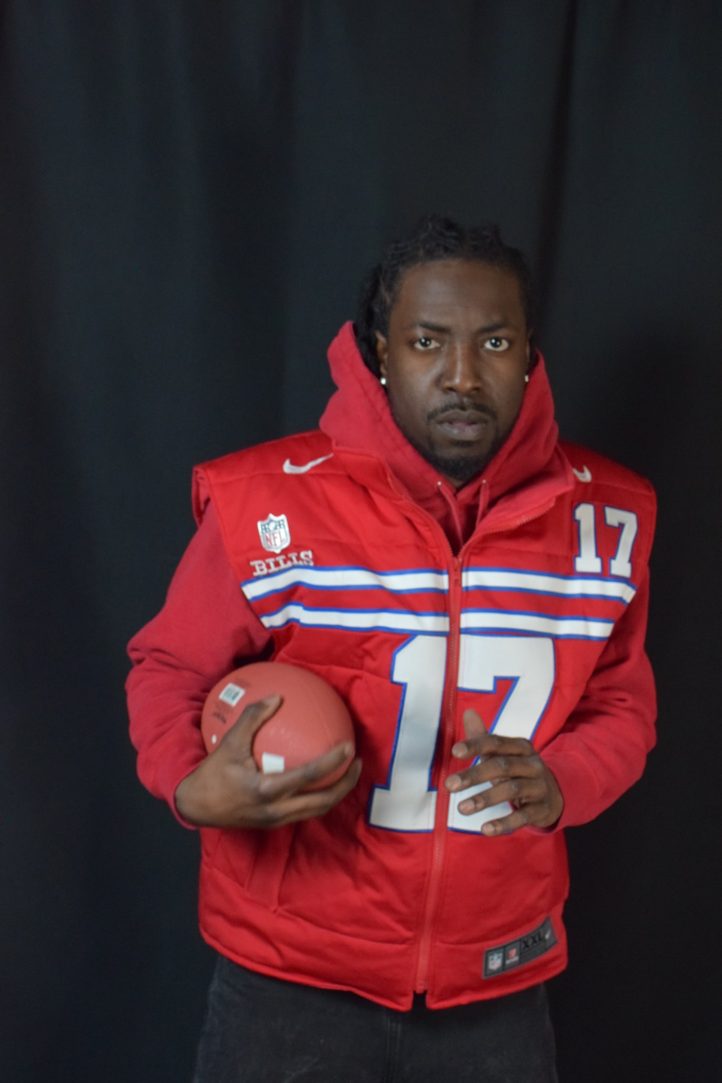 Custom TMADE puffer vest built from a Buffalo Bills Allen number 17 jersey