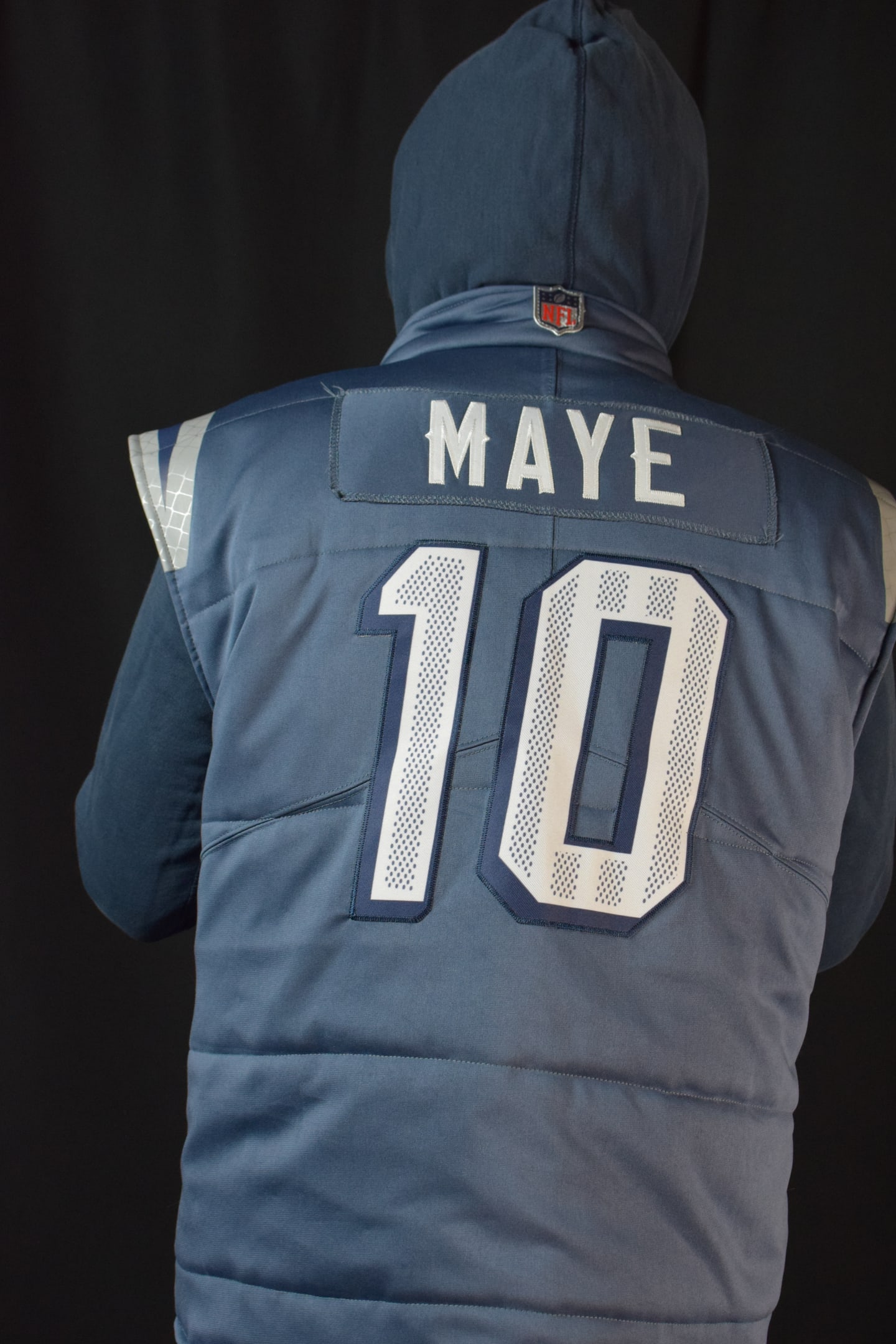 Custom TMADE puffer vest built from a New England Patriots Maye number 10 jersey