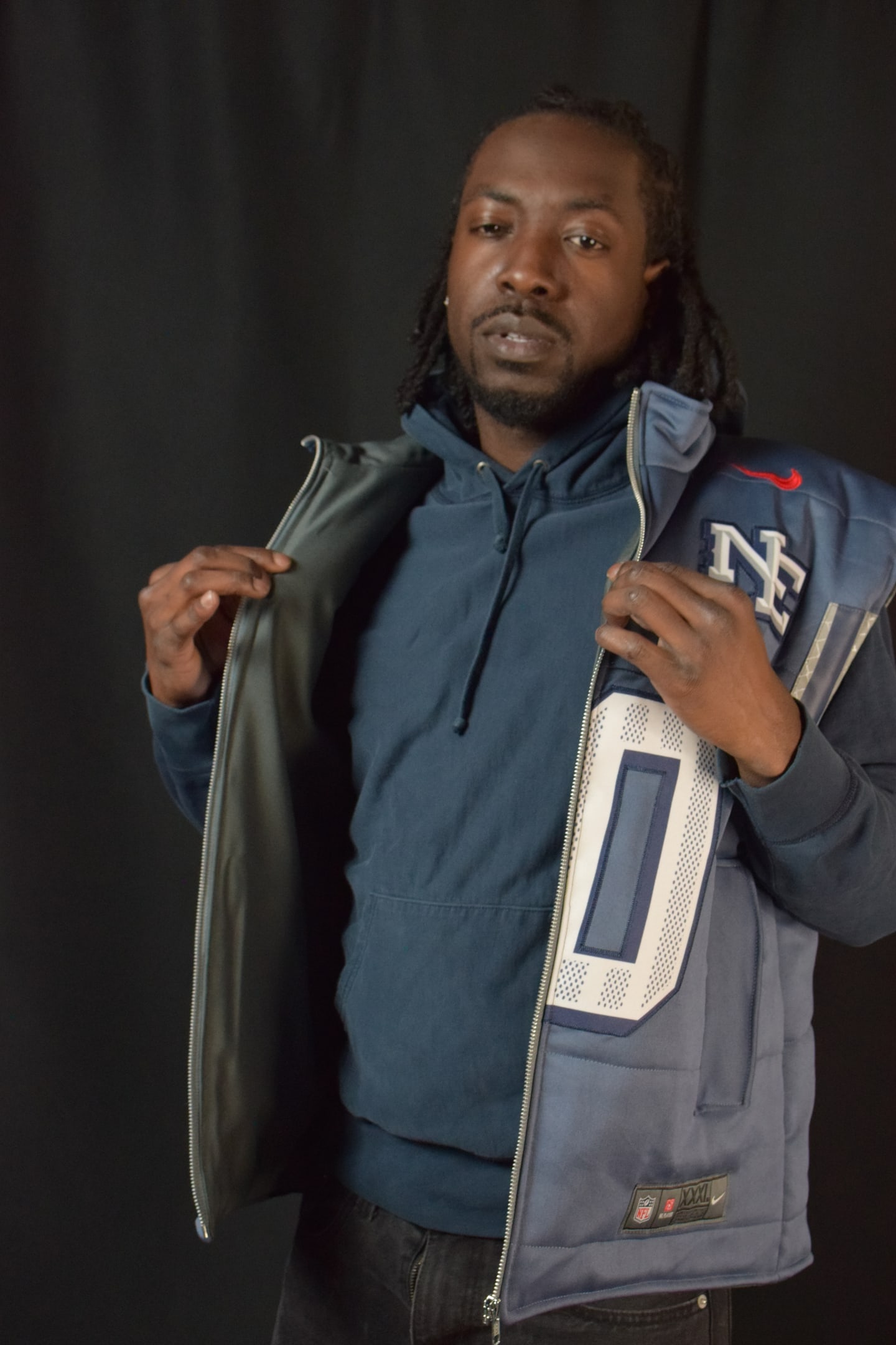 Custom TMADE puffer vest built from a New England Patriots Maye number 10 jersey
