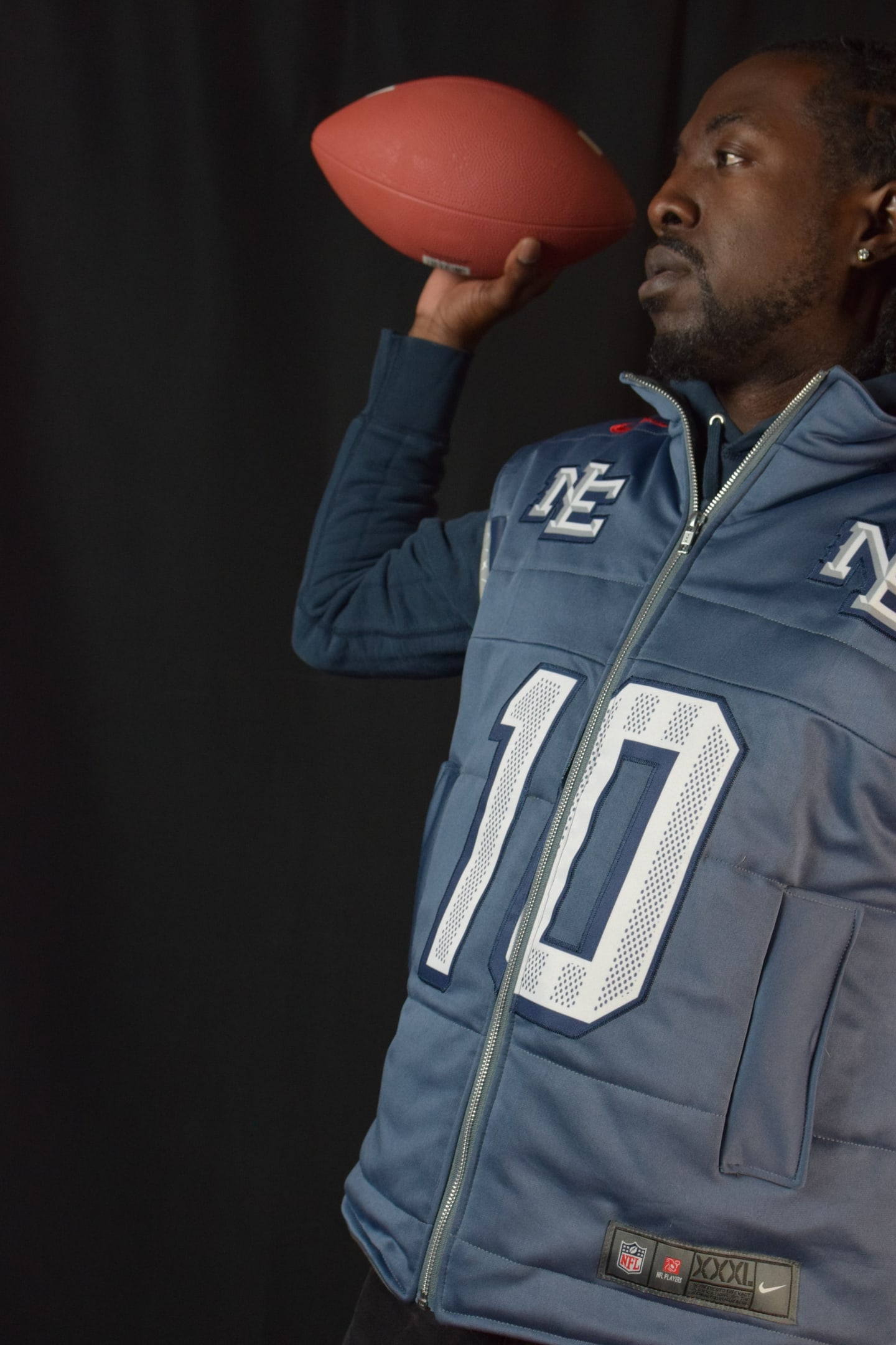 Custom TMADE puffer vest built from a New England Patriots Maye number 10 jersey