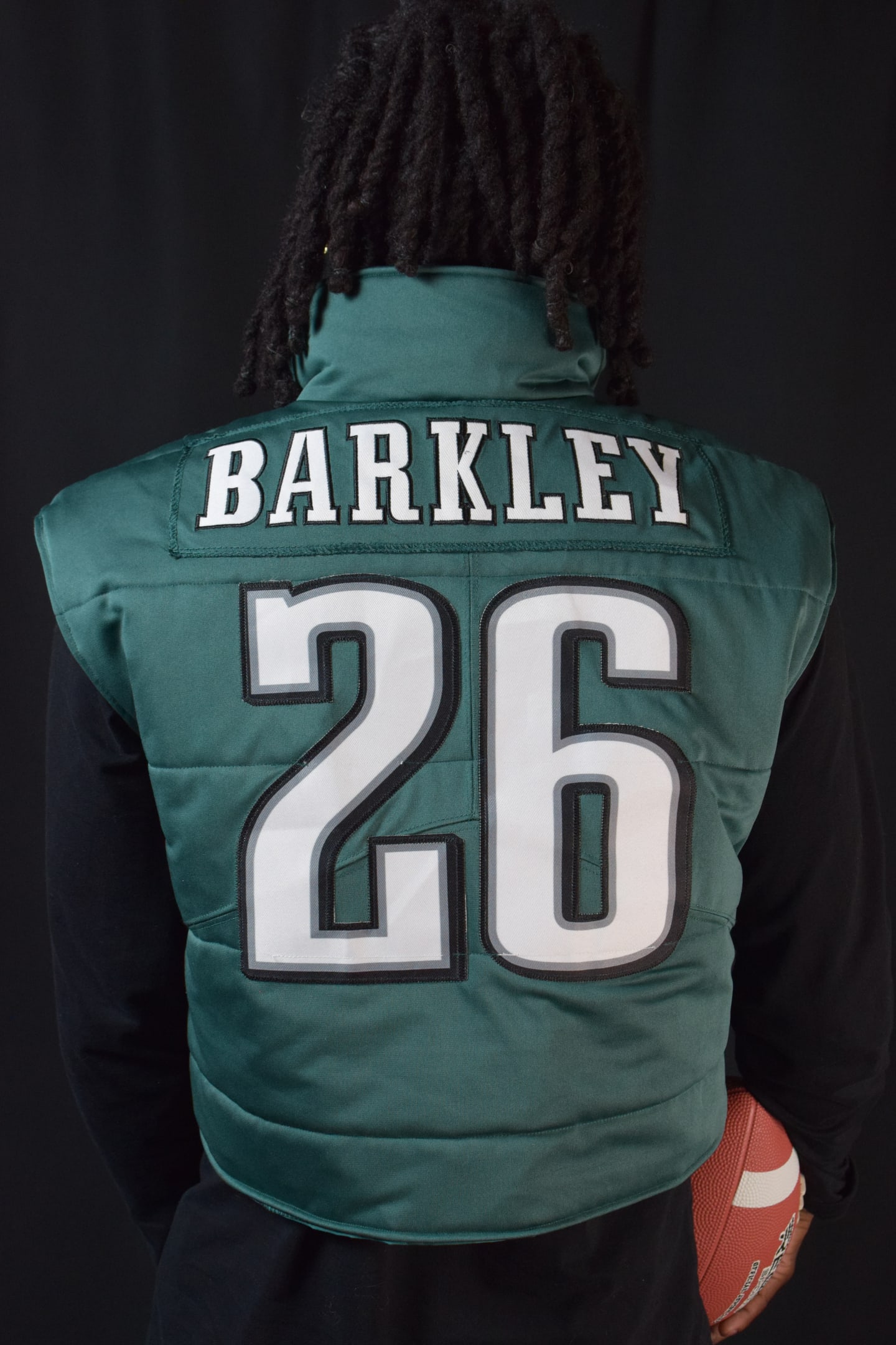 Custom TMADE puffer vest built from a Philadelphia Eagles Barkley number 26 jersey