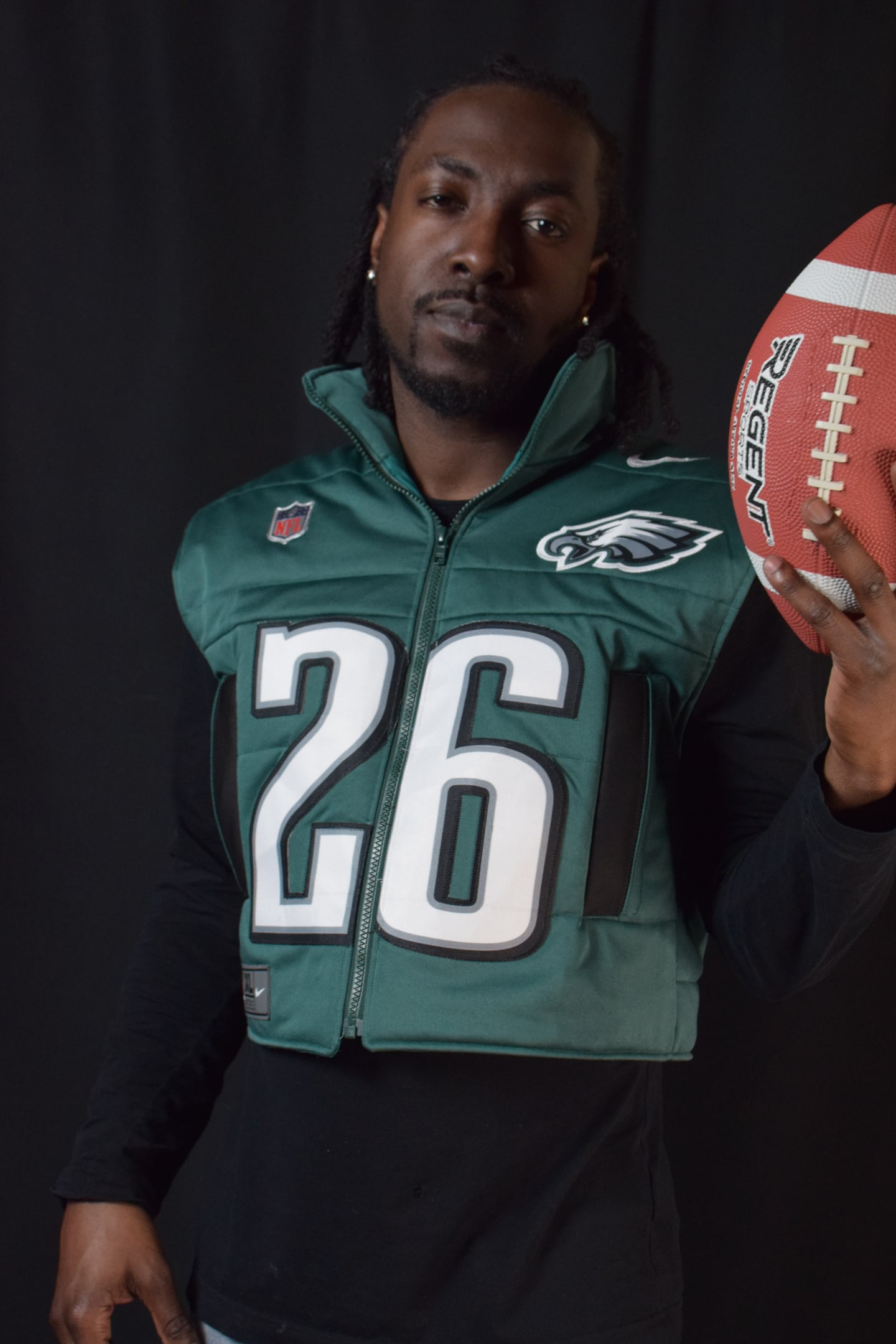 Custom TMADE puffer vest built from a Philadelphia Eagles Barkley number 26 jersey