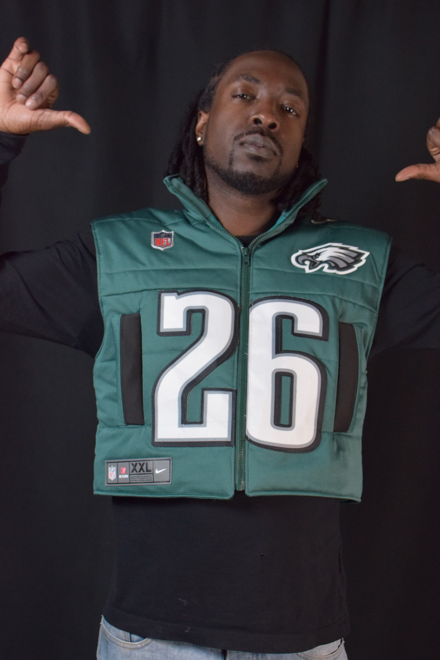 Custom TMADE puffer vest built from a Philadelphia Eagles Barkley number 26 jersey
