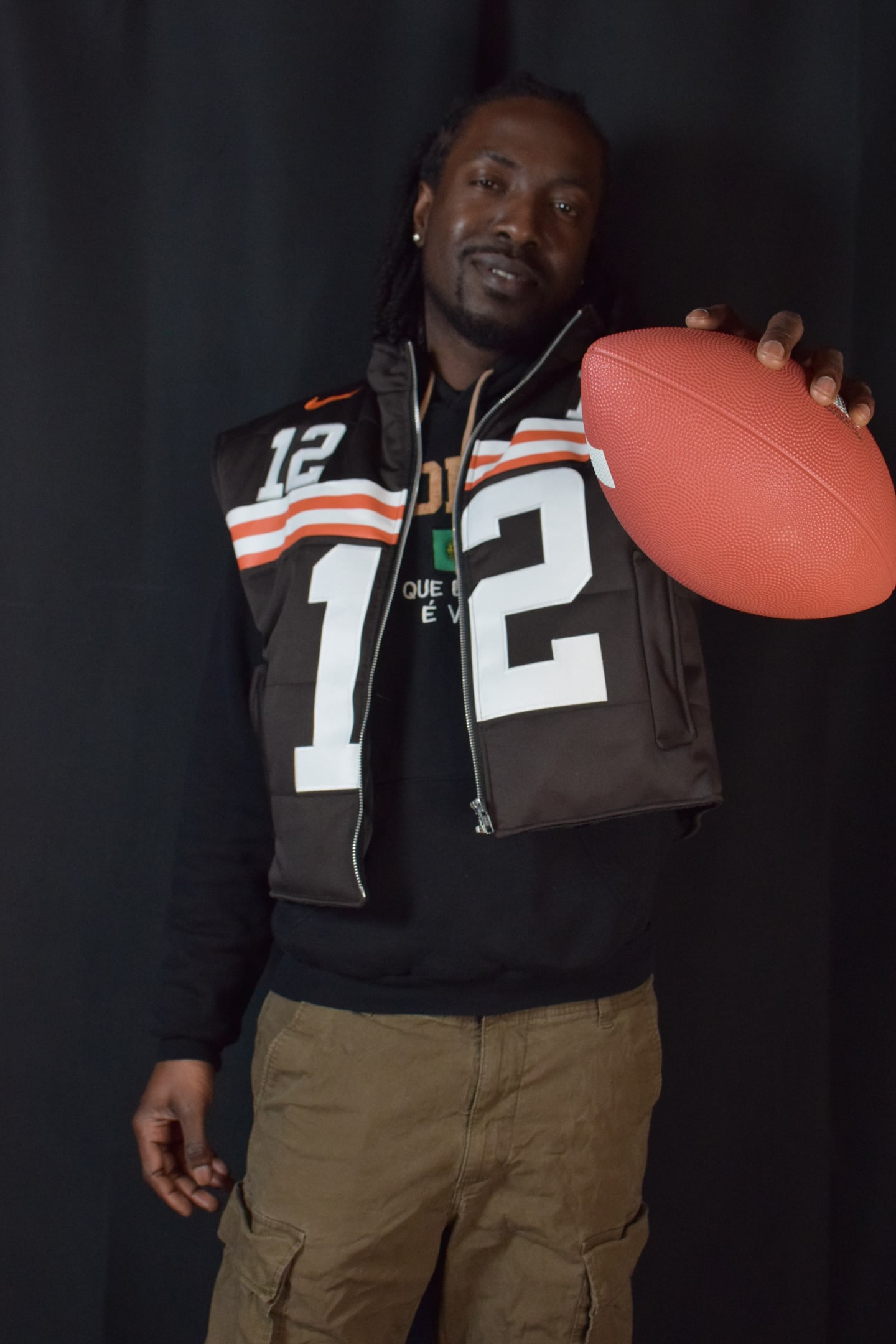 Custom TMADE puffer vest built from a Cleveland Browns Sanders number 12 jersey