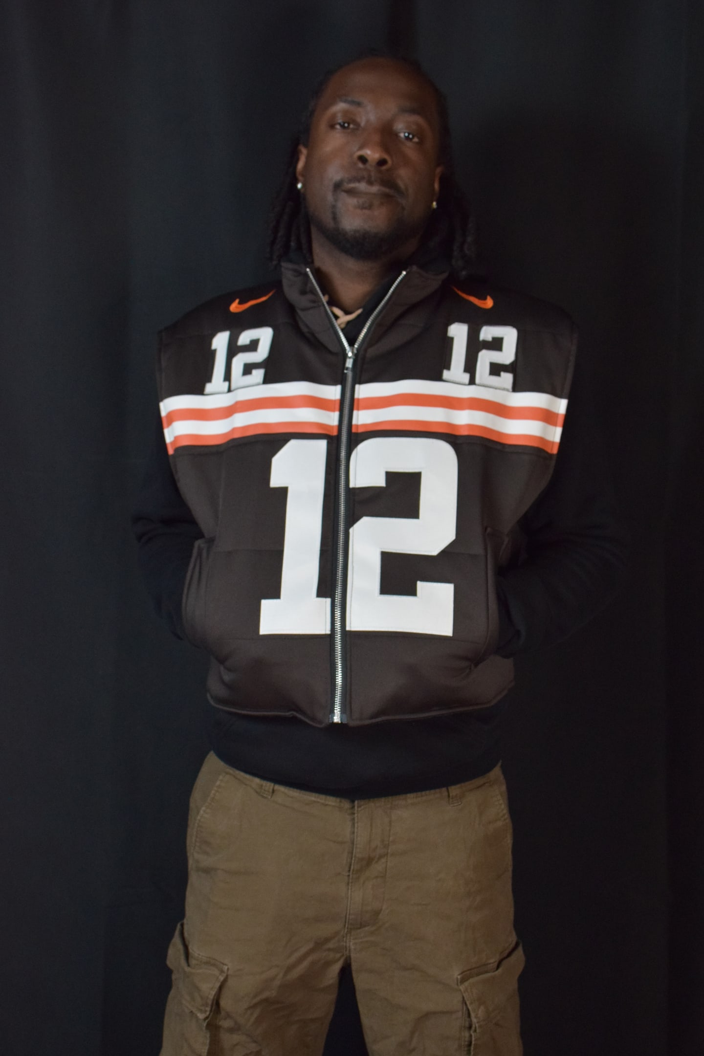 Custom TMADE puffer vest built from a Cleveland Browns Sanders number 12 jersey