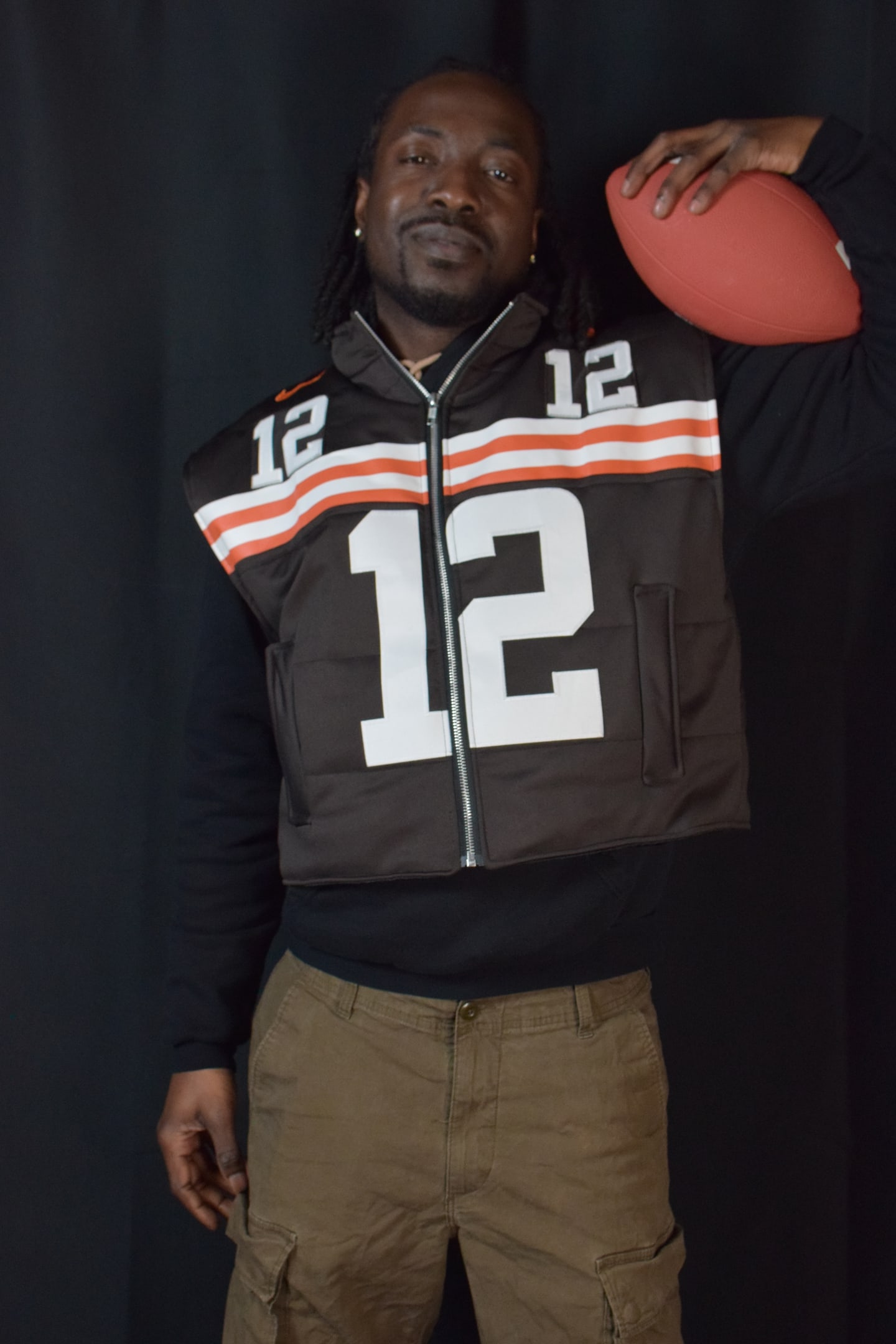 Custom TMADE puffer vest built from a Cleveland Browns Sanders number 12 jersey