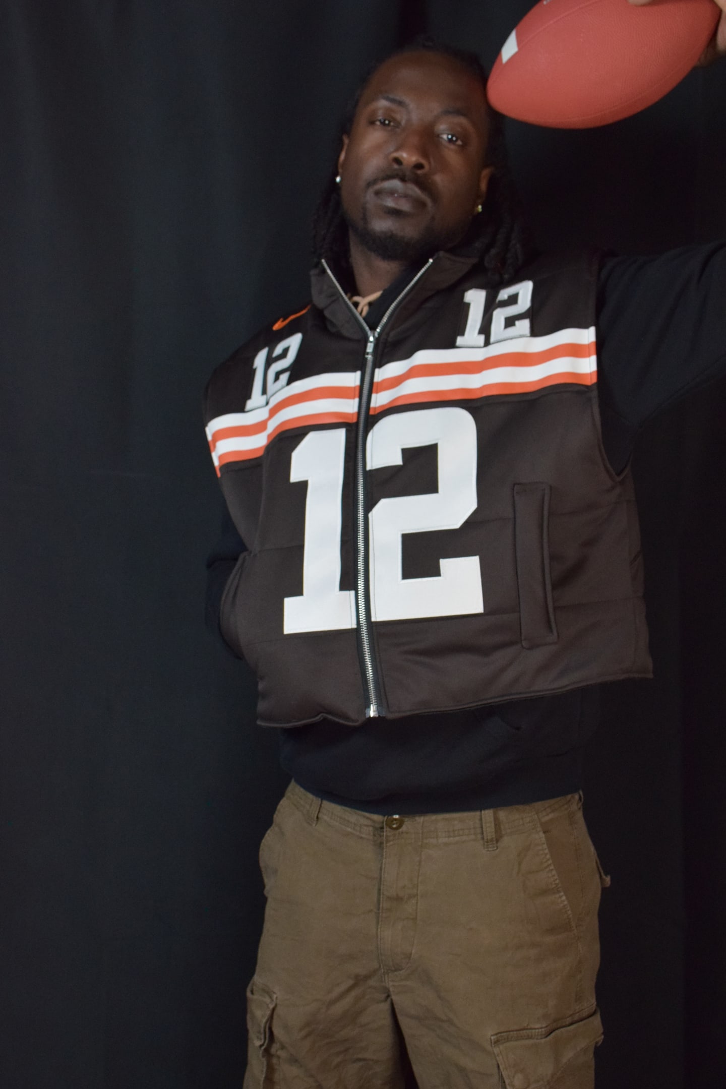 Custom TMADE puffer vest built from a Cleveland Browns Sanders number 12 jersey