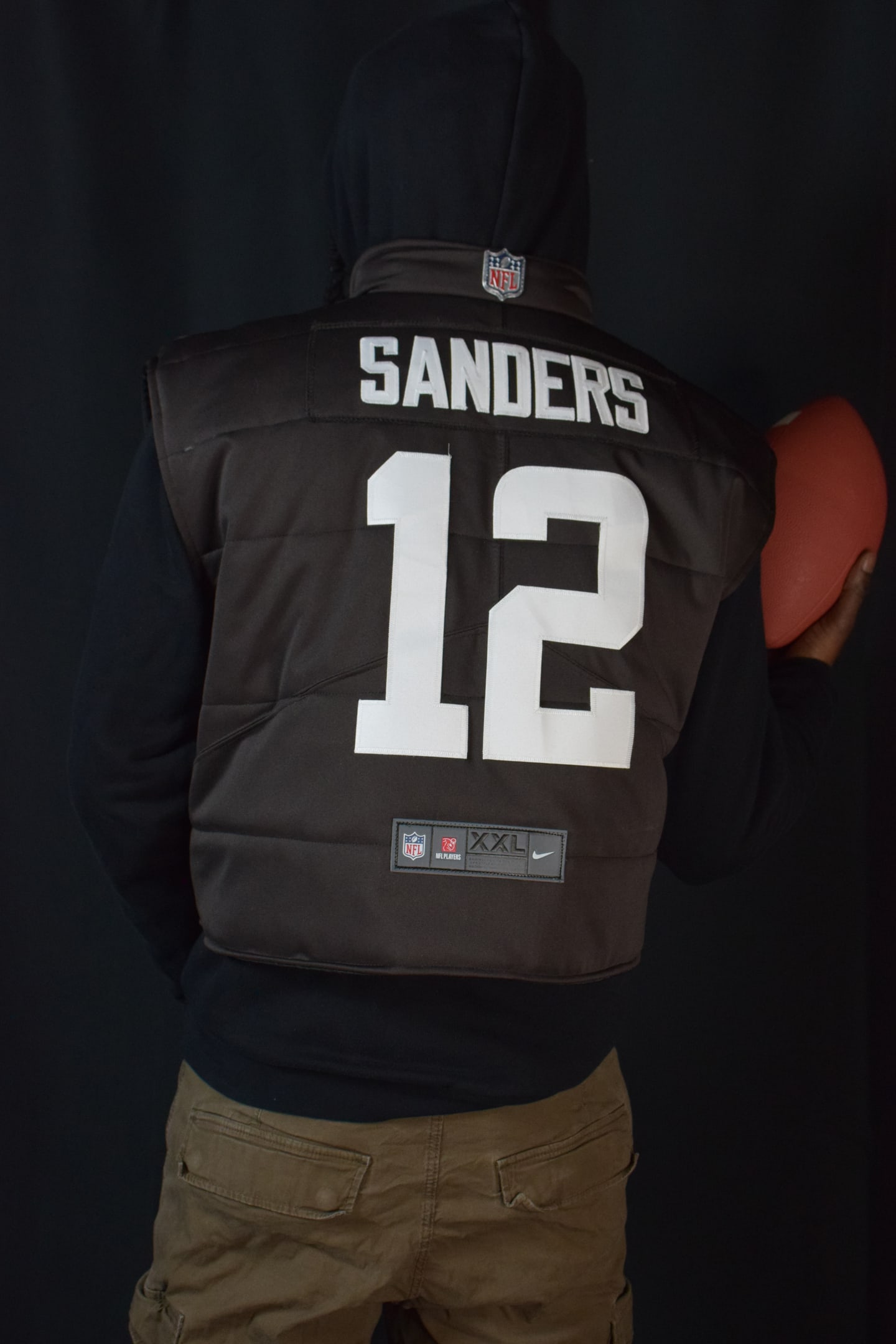 Custom TMADE puffer vest built from a Cleveland Browns Sanders number 12 jersey