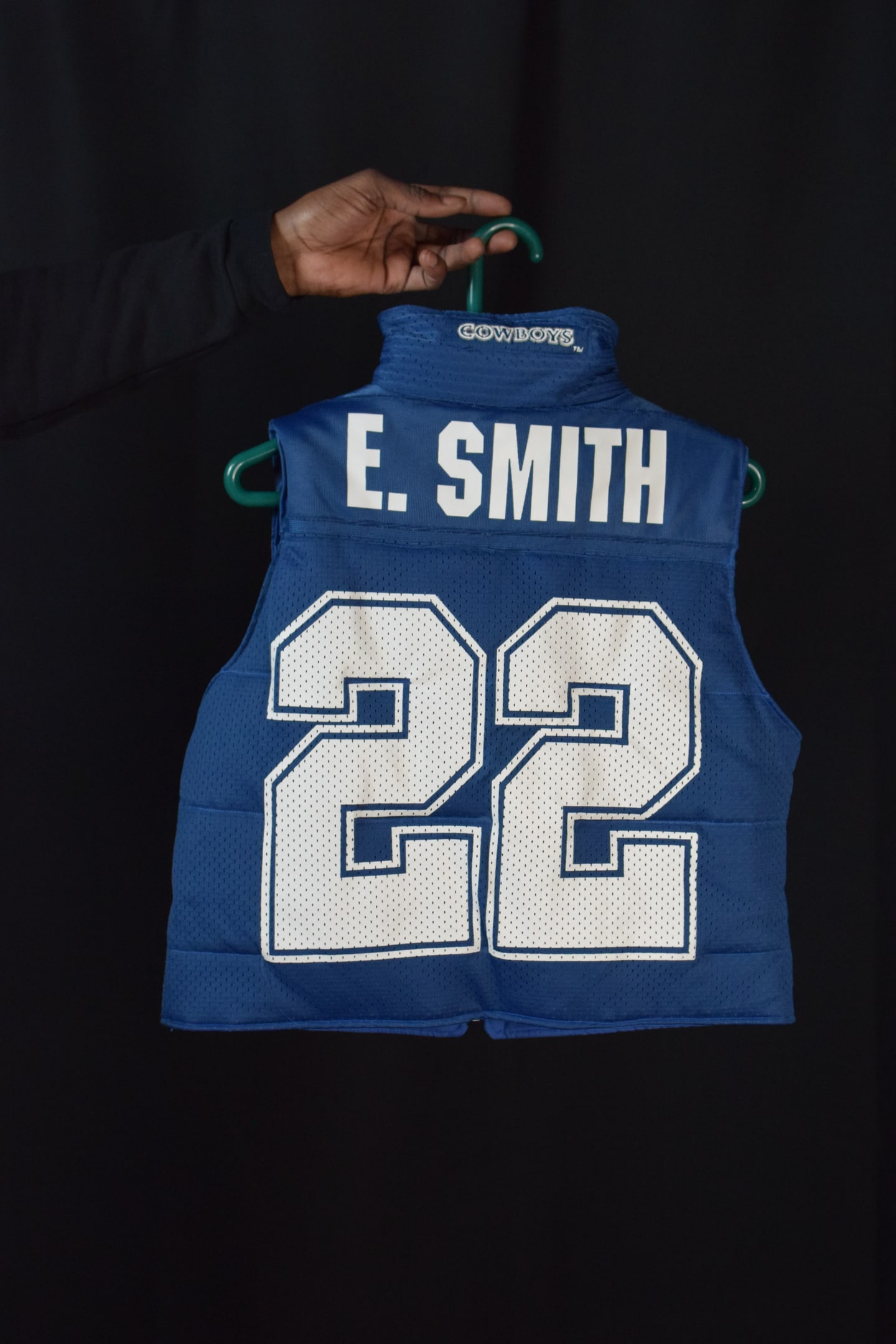 Custom TMADE puffer vest built from a Dallas Cowboys E. Smith number 22 jersey
