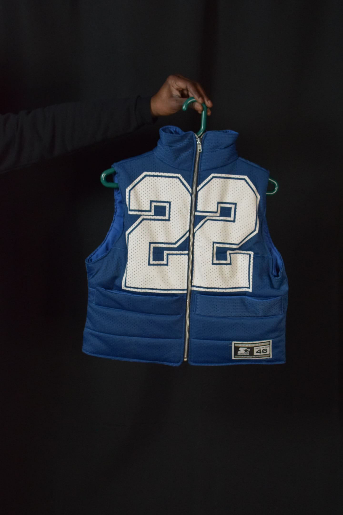 Custom TMADE puffer vest built from a Dallas Cowboys E. Smith number 22 jersey