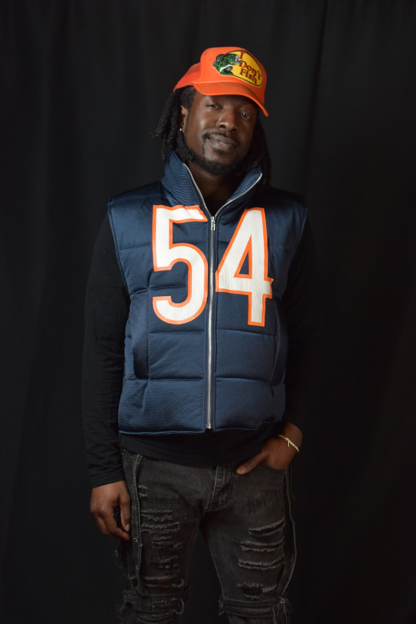 Custom TMADE puffer vest built from a Chicago Bears Urlacher number 54 jersey