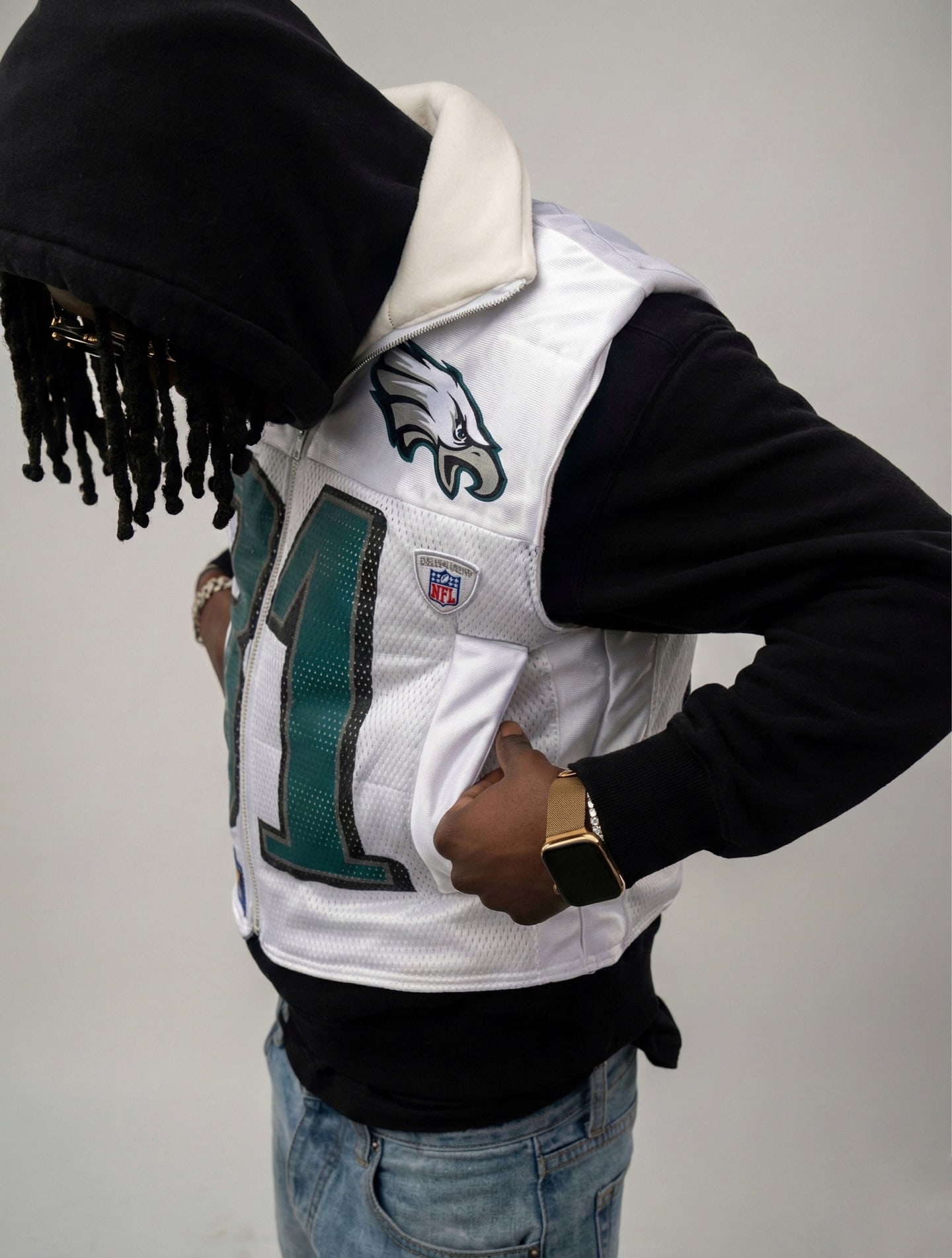 Custom TMADE puffer vest built from a Philadelphia Eagles Owens number 81 jersey