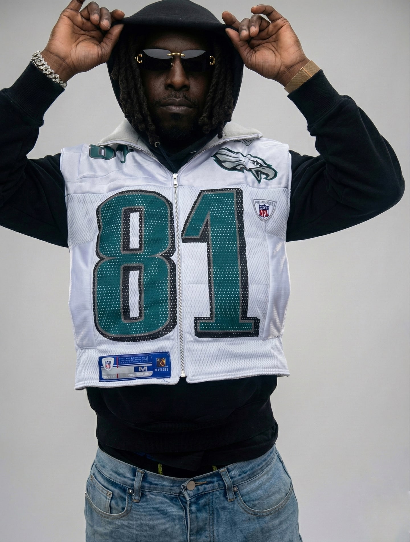 Custom TMADE puffer vest built from a Philadelphia Eagles Owens number 81 jersey