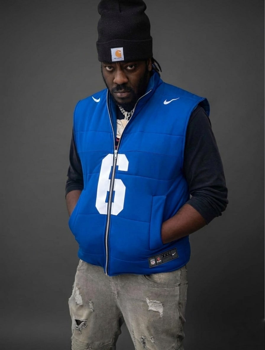 Custom TMADE puffer vest built from a New York Giants Dart number 6 jersey