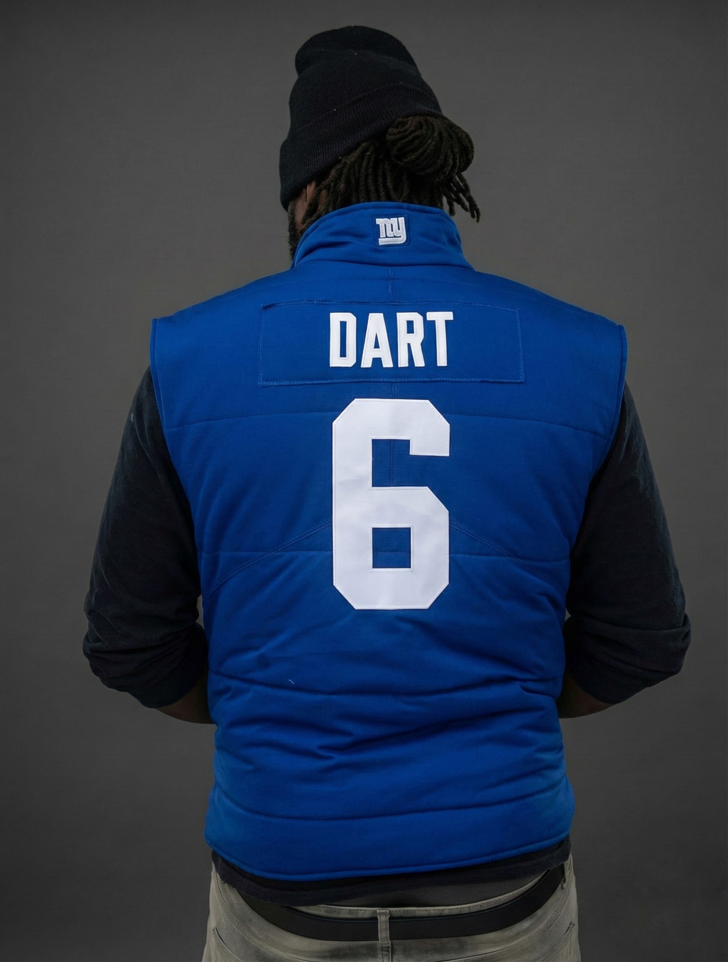 Custom TMADE puffer vest built from a New York Giants Dart number 6 jersey